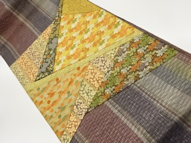 すくい織切り嵌め金彩縞に草花・古典柄模様織出し袋帯